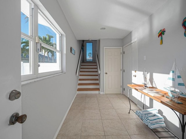 interior space with light tile patterned flooring