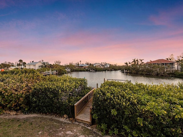 property view of water featuring a dock