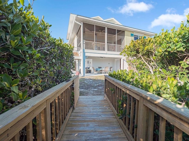 back of house with a patio and a sunroom