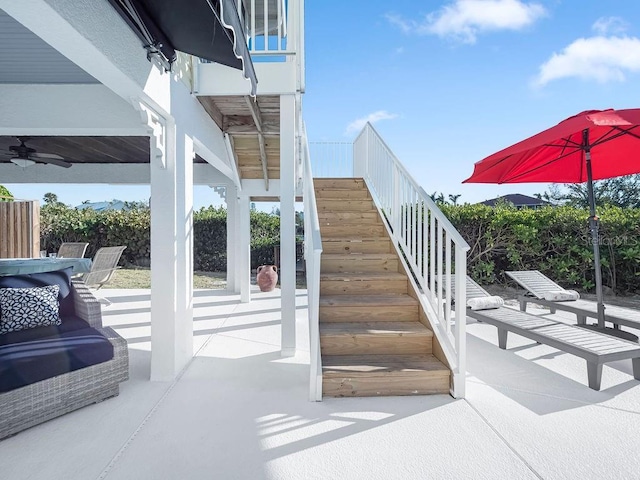 114 Gull Dr, Anna Maria, FL 34216 - view of patio / terrace with stairs and ceiling fan