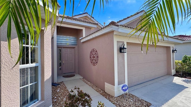 property entrance featuring a garage