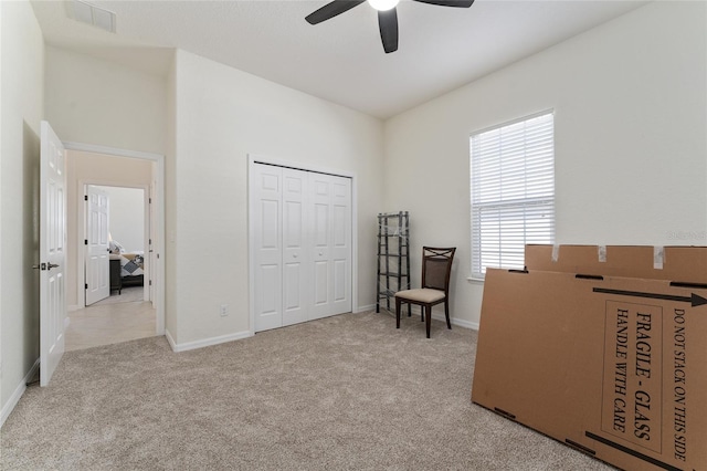 interior space with a closet and ceiling fan