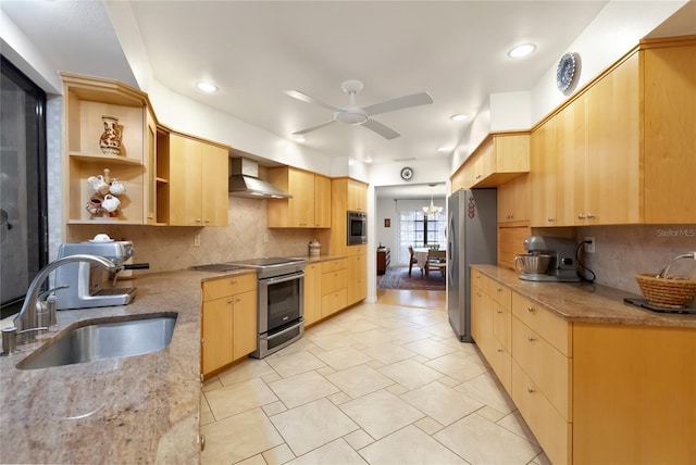 kitchen featuring sink, stainless steel appliances, decorative backsplash, wall chimney exhaust hood, and light brown cabinets