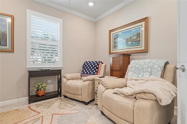 sitting room with crown molding