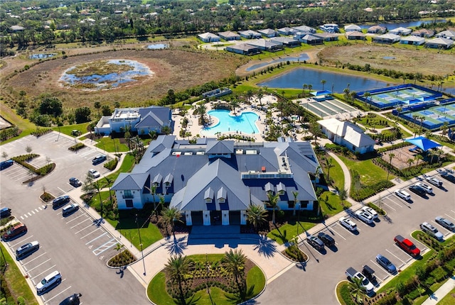 drone / aerial view with a water view