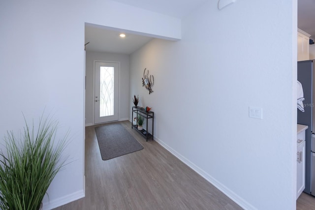 foyer with light wood-type flooring