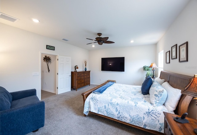 carpeted bedroom with ceiling fan