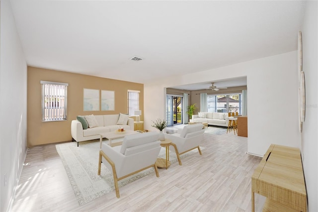 living room with light hardwood / wood-style floors