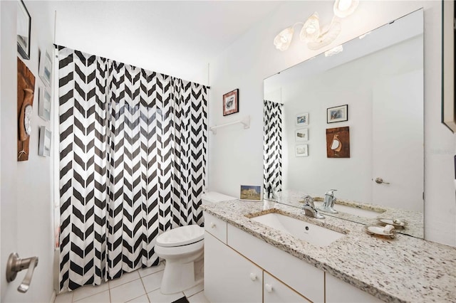 bathroom with tile patterned flooring, vanity, toilet, and a shower with shower curtain