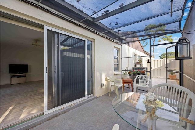 view of patio with a lanai