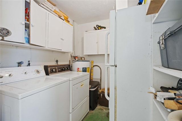 laundry room featuring cabinets and separate washer and dryer