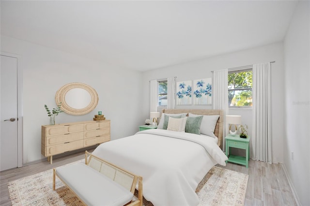 bedroom with wood-type flooring