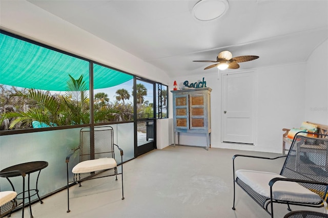 sunroom / solarium with ceiling fan