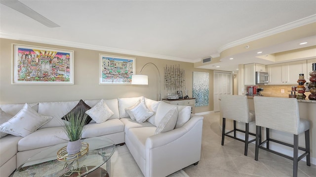 living room featuring ornamental molding