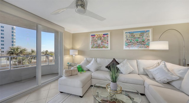 living room featuring crown molding, light tile patterned floors, and ceiling fan