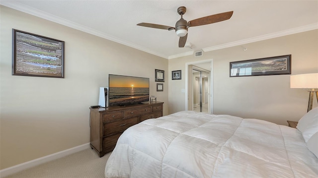 bedroom with ornamental molding, light colored carpet, and ceiling fan