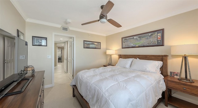 bedroom featuring light carpet, ornamental molding, and ceiling fan