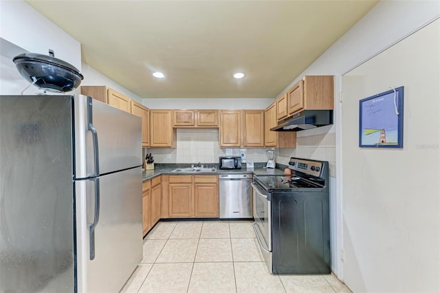 kitchen with sink, light tile patterned floors, stainless steel appliances, tasteful backsplash, and light brown cabinets