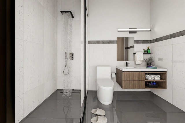 bathroom with a shower, tile walls, tile patterned flooring, vanity, and toilet