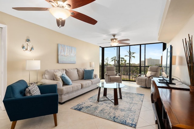 tiled living room featuring floor to ceiling windows