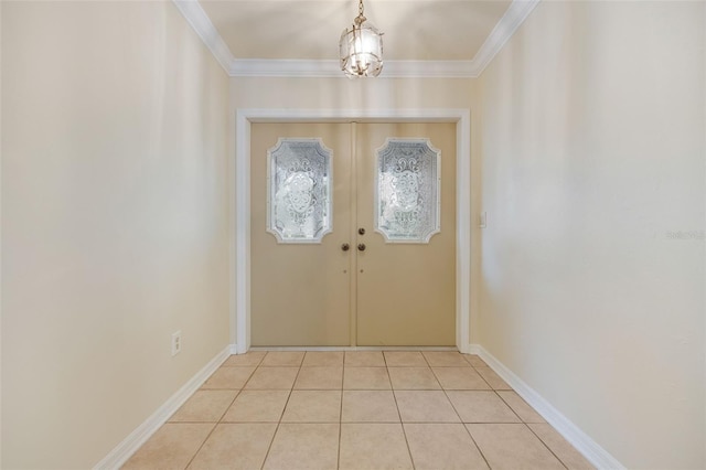 doorway to outside featuring french doors, crown molding, an inviting chandelier, and light tile patterned floors