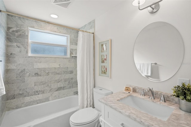 full bath with shower / bath combo, visible vents, vanity, and toilet