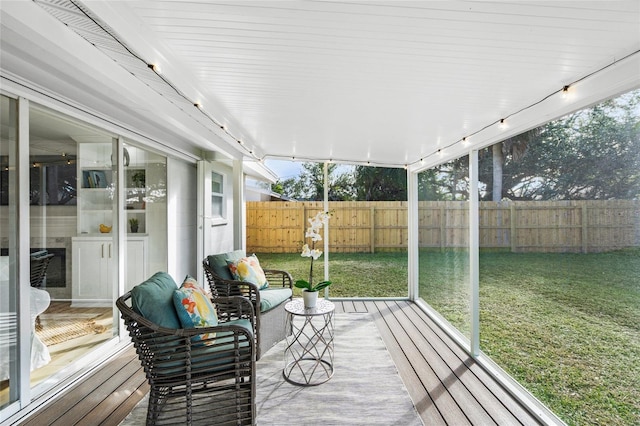 sunroom / solarium featuring a wealth of natural light