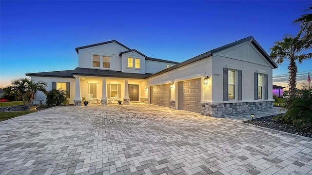 view of front of home with a garage