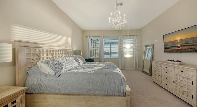 bedroom with lofted ceiling, light carpet, and a notable chandelier