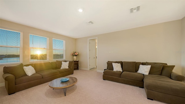 living room featuring light colored carpet