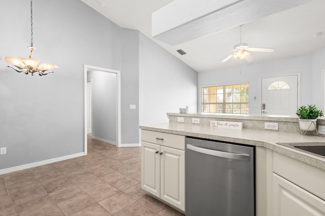 kitchen with ceiling fan with notable chandelier, white cabinetry, lofted ceiling, hanging light fixtures, and stainless steel dishwasher