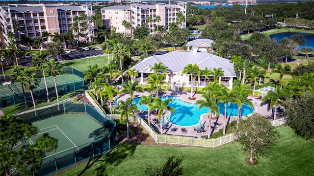 birds eye view of property with a water view