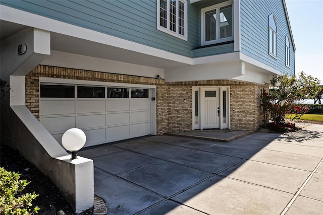 property entrance with a garage