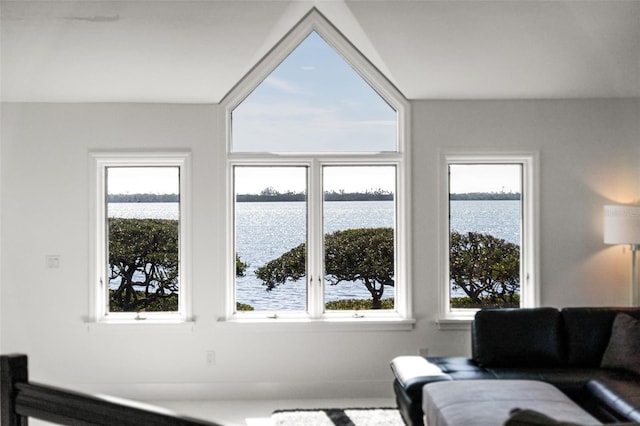 living room featuring a water view