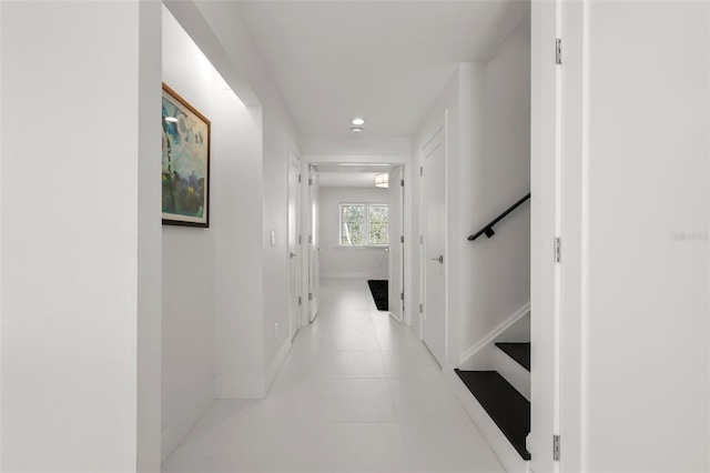 hallway featuring light tile patterned floors