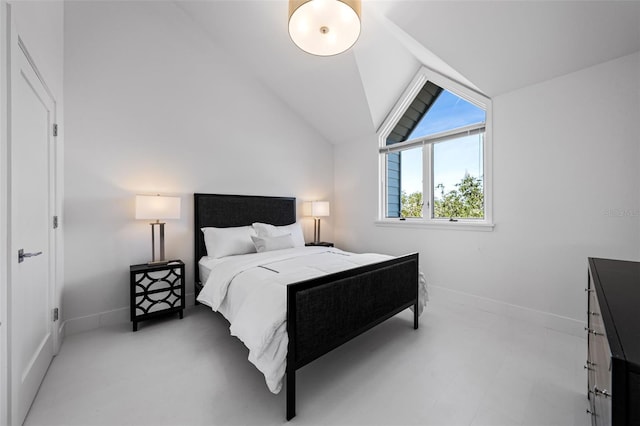 bedroom featuring vaulted ceiling