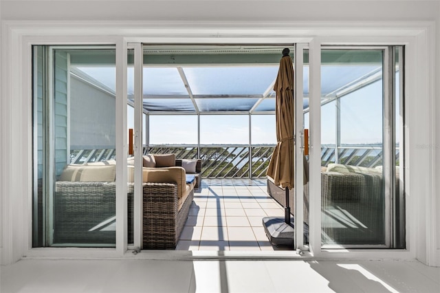 doorway to outside featuring light tile patterned floors