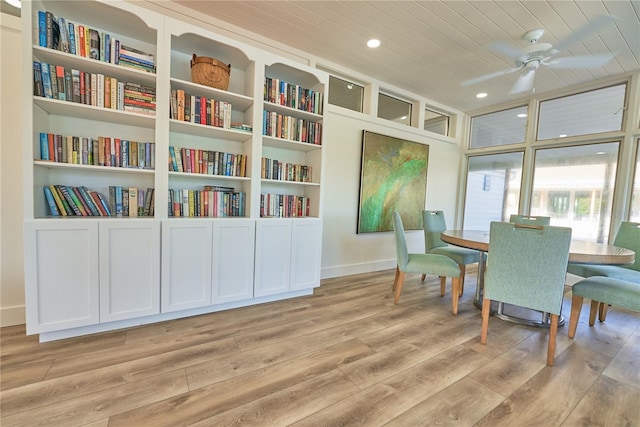 living area featuring ceiling fan, wood ceiling, and light wood-type flooring