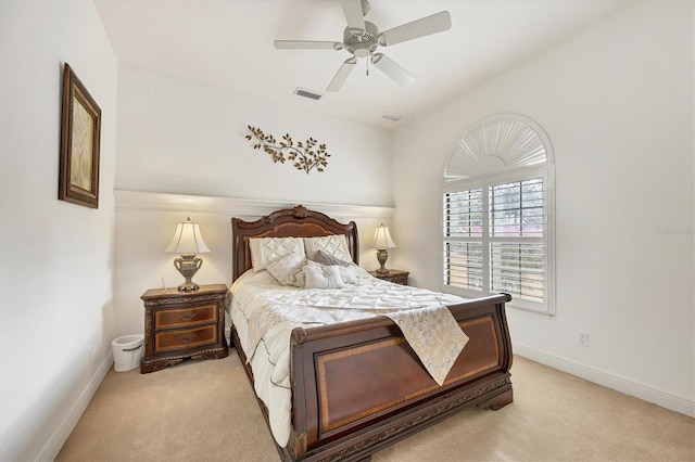 bedroom with light carpet and ceiling fan