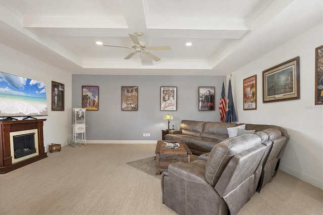 living room featuring coffered ceiling, crown molding, ceiling fan, beamed ceiling, and light colored carpet