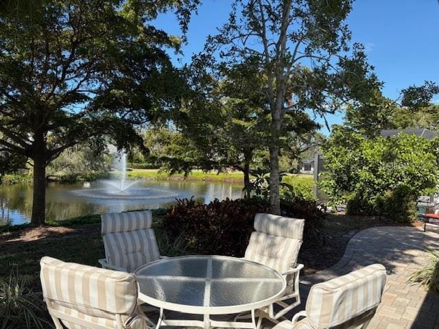 view of patio featuring a water view