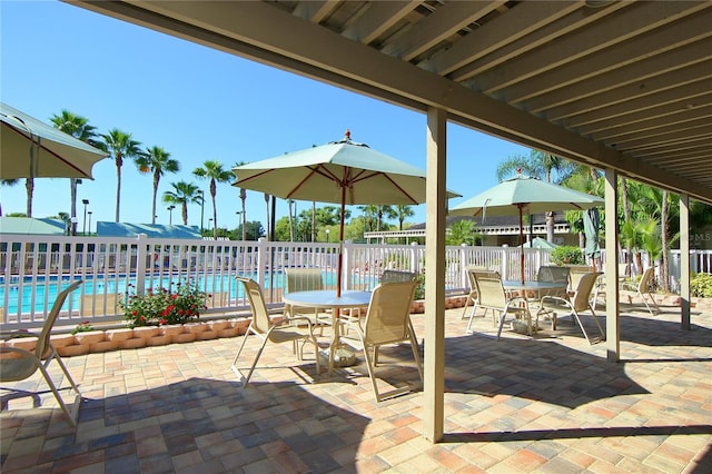 view of patio with a community pool