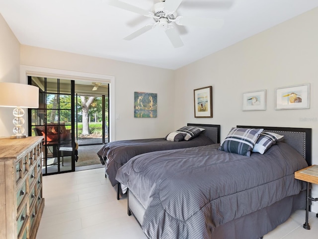 bedroom featuring ceiling fan and access to exterior