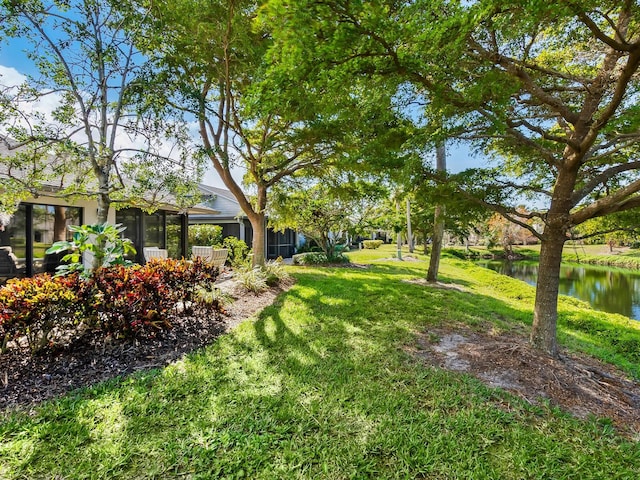 view of yard with a water view