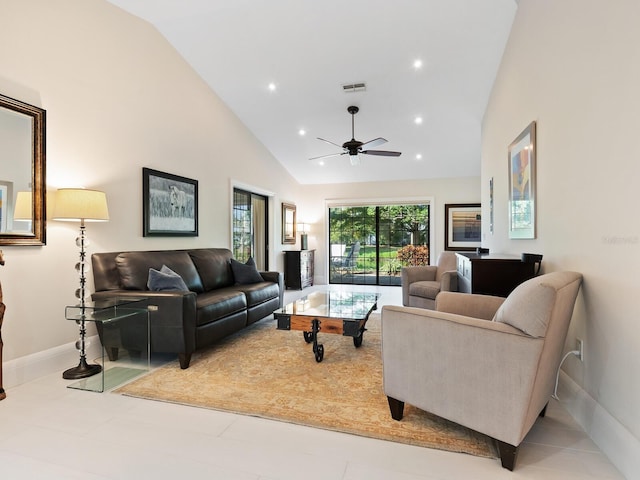 living room with ceiling fan and high vaulted ceiling