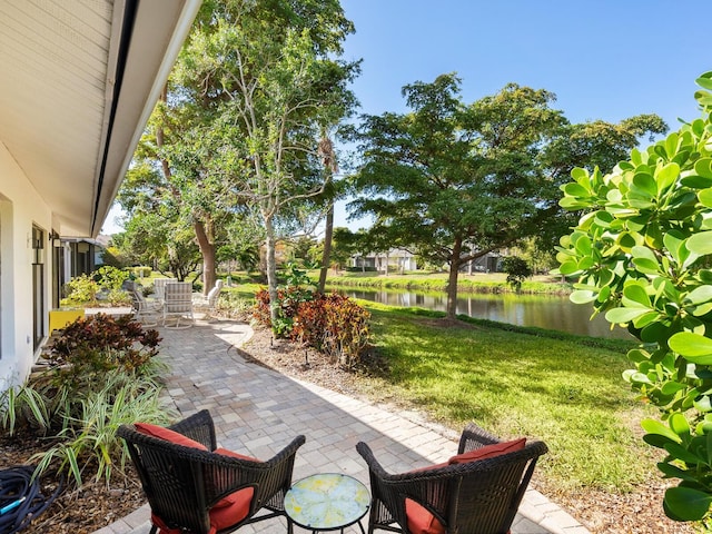 view of patio / terrace featuring a water view