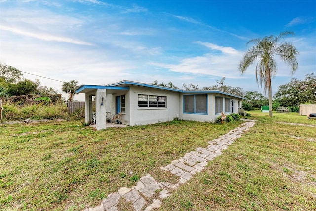 view of front of property with a front yard