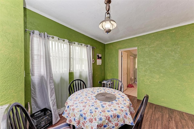 dining area with hardwood / wood-style flooring