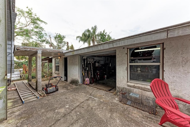 view of patio with a garage