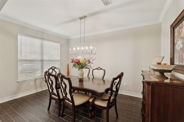 dining space featuring ornamental molding